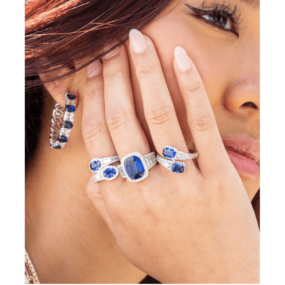 stack of sapphire and diamond rings with diamond and sapphire hoop earrings, Oval Sapphire and Diamonds Bypass Ring