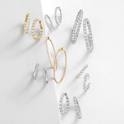 multiple pairs of diamond hoop earrings