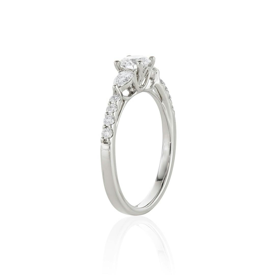 Three-Stone Round and Pear Shape White Gold Engagement Ring 1